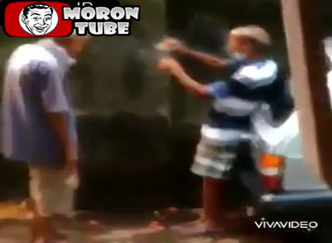 Video :A bottle of alcohol is being shared by two men
